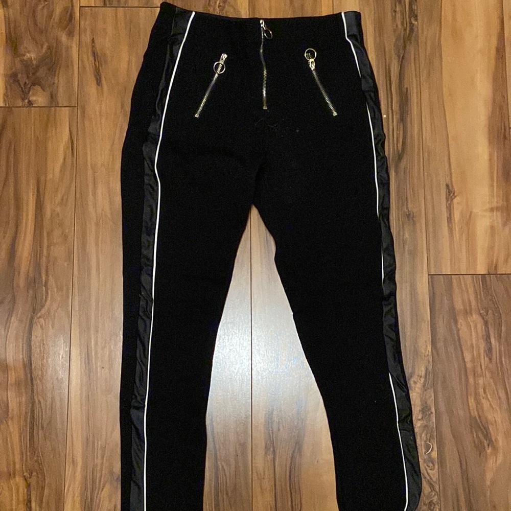Black stretchy pants with side designs